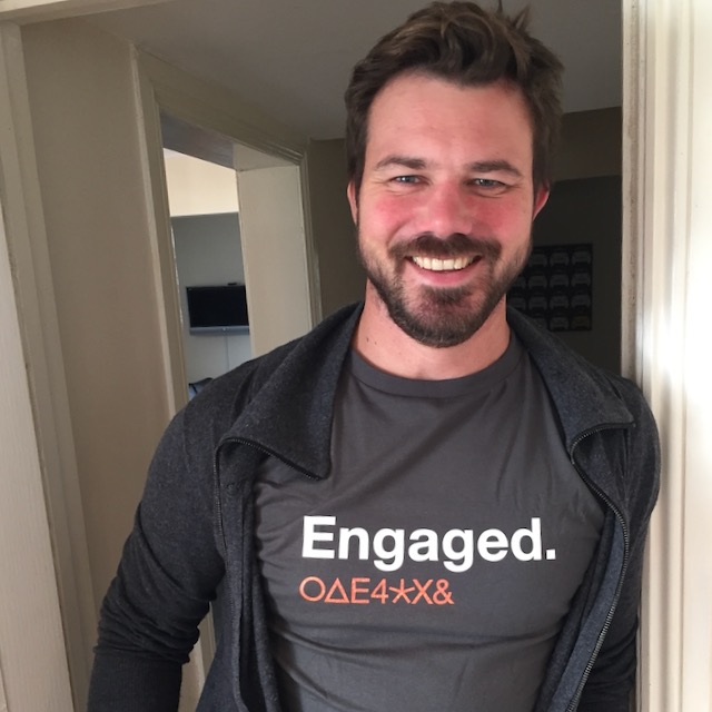 Scott wearing a t-shirt that says